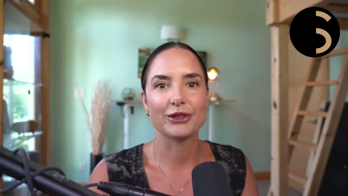 Karla Treadway speaking into microphone in Sovereign Sphere interview